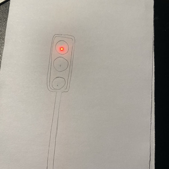 Traffic light design. (There is a fading light up effect when the cloth is added to the back)      