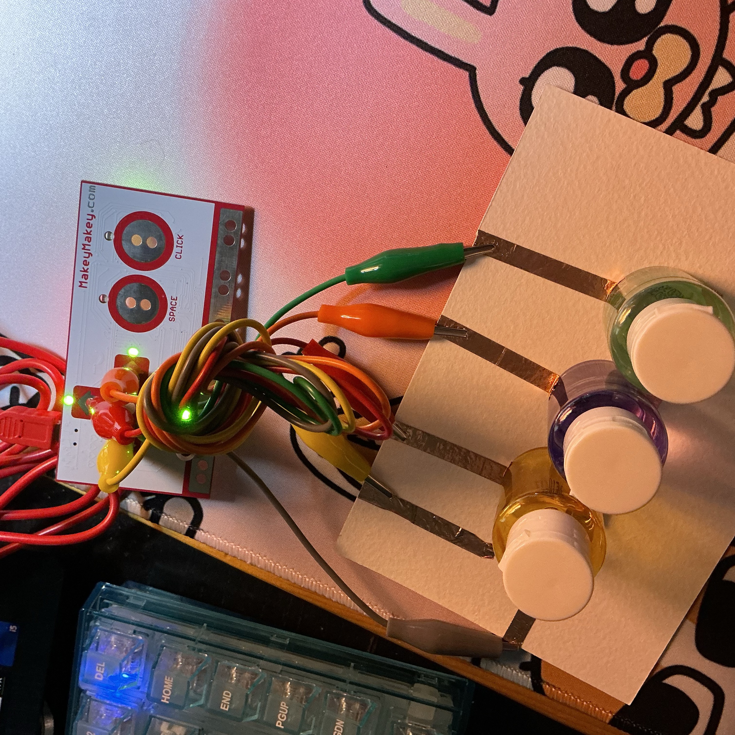 This is my model using the plastic bottle to link the copper tape.