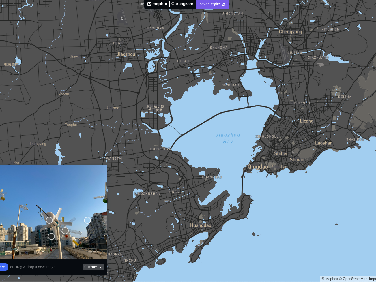 Map of Qingdao with gray and light blue colors.